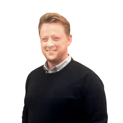 An image of John Cassidy smiling, on a transparent background